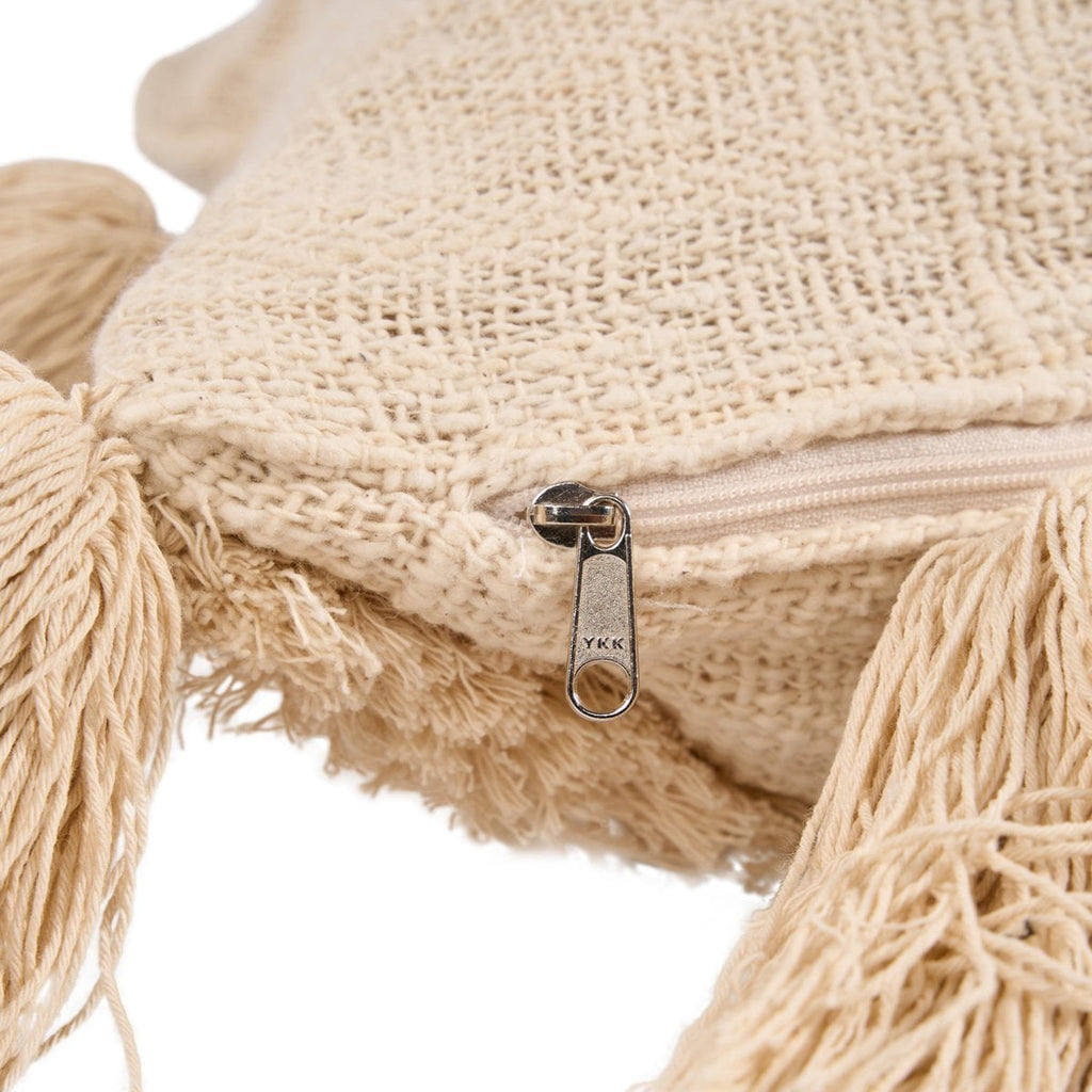 Housse de coussin à pompons Nomad – Crème – 35×60cm | Bazar Bizar